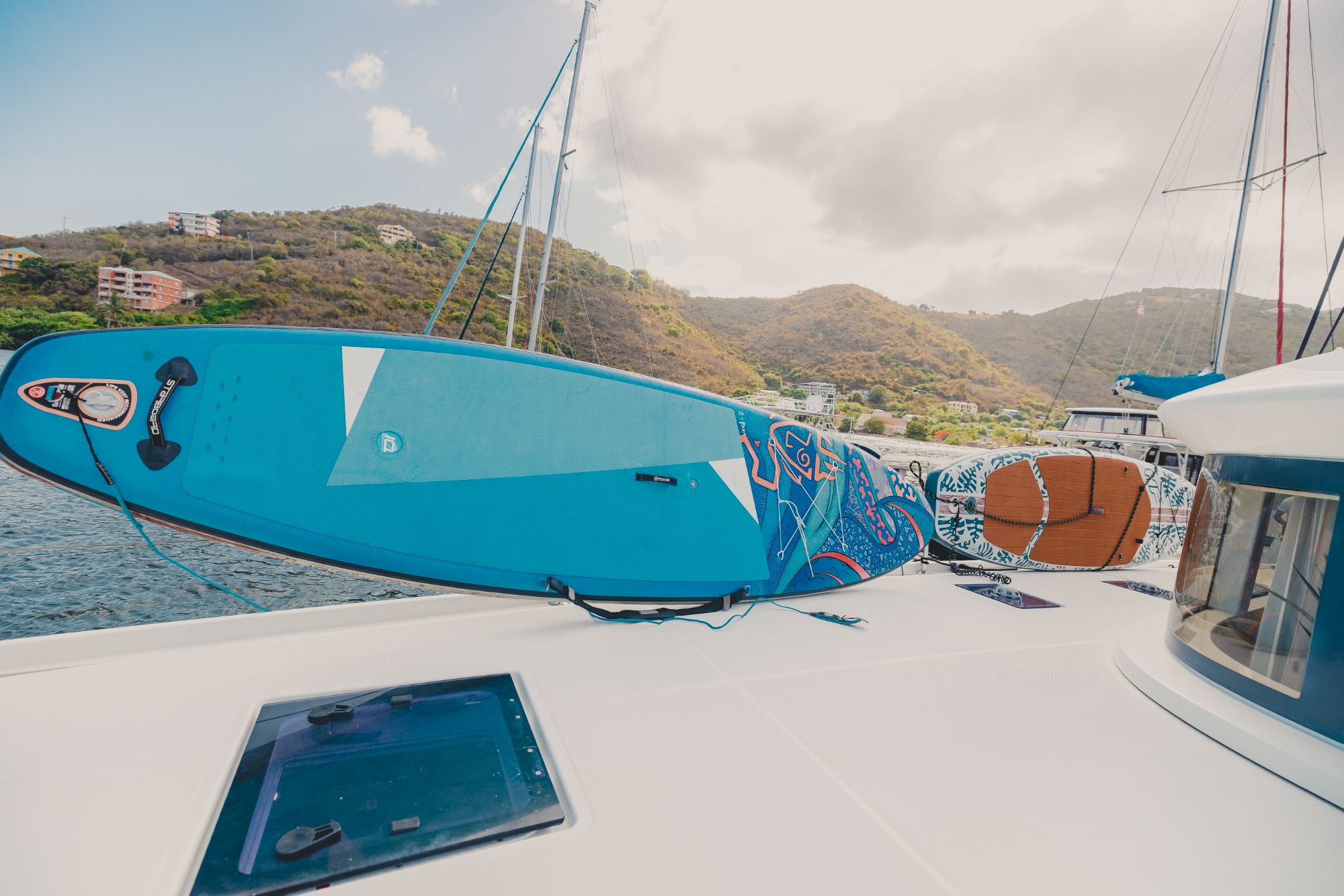 SUP paddleboard on foredeck
